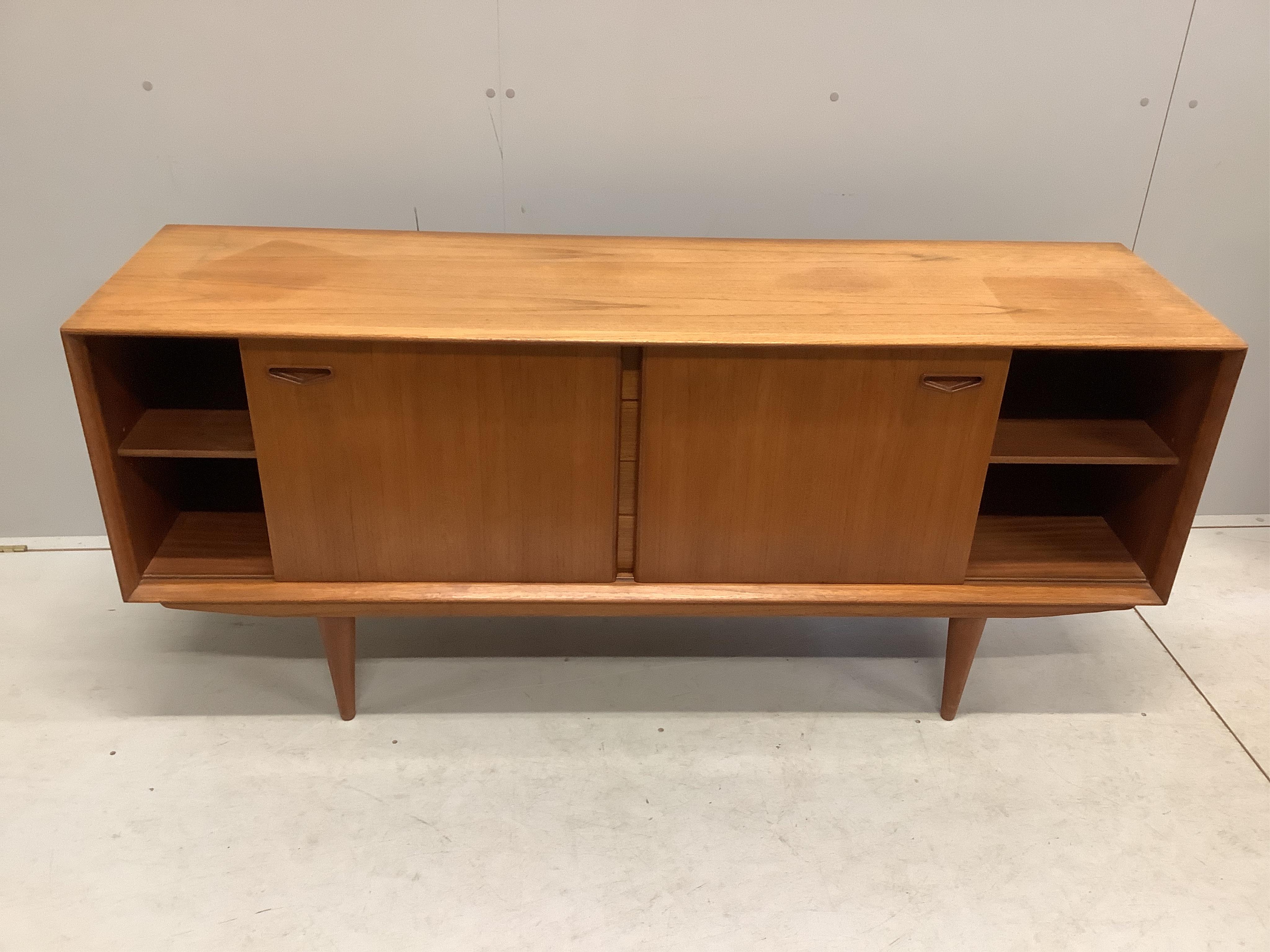 Clausen & Son, a mid century Danish teak sideboard, width 160cm, depth 45cm, height 70cm. Condition - fair